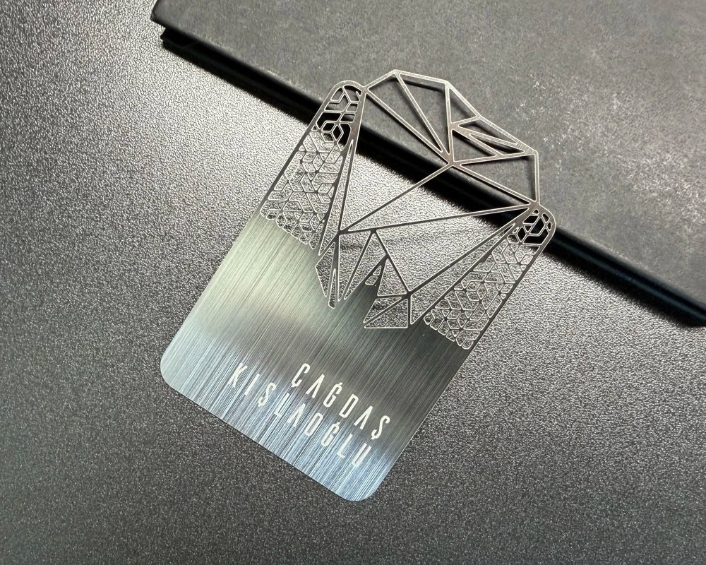 Cut-out brushed stainless steel metal cards